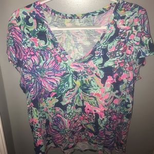 V-NECK LILLY TOPS. Like new conditions.